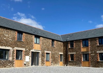 A stunning barn conversion including flush casement uPVC windows achieving a traditional timber window appearance