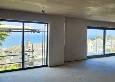 White aluminium bi fold doors installed in Newquay