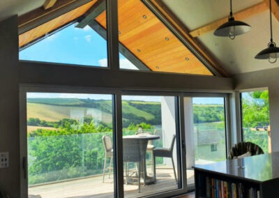 Aluminium shaped windows and lift and slide sliding patio doors supplied and fitted for a job in Newquay