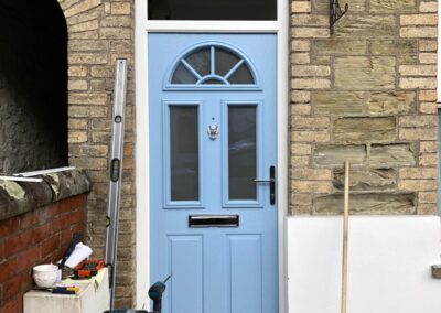 Composite door complete with fanlight glazed panel